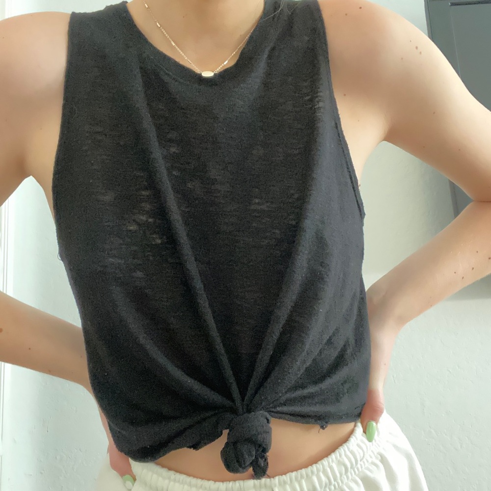 Black sleeveless knit top